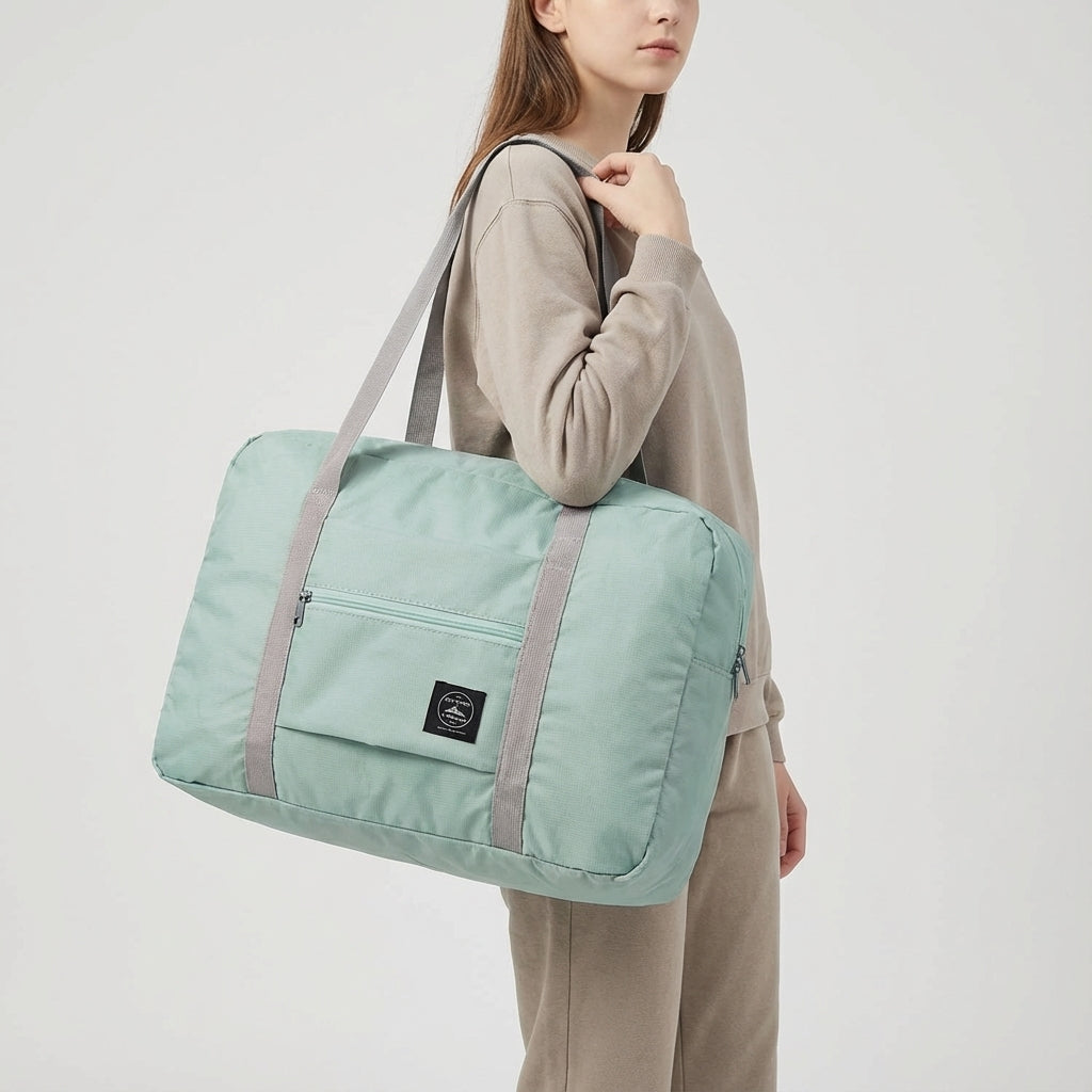 Durable waterproof fabric of the foldable duffel bag, showing its lightweight & travel-ready design.