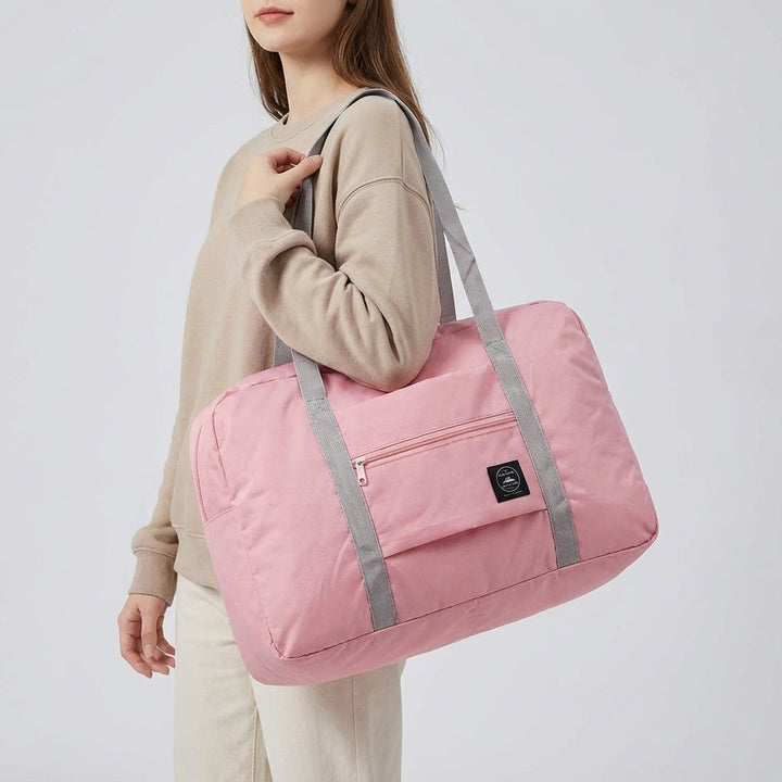 Versatile unisex travel duffel bag, ideal as a foldable lightweight carry-on or weekend bag for any trip.