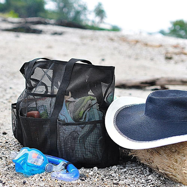 Foldable mesh beach tote with 9 pockets, a versatile travel and storage bag for vacation essentials & pool gear.