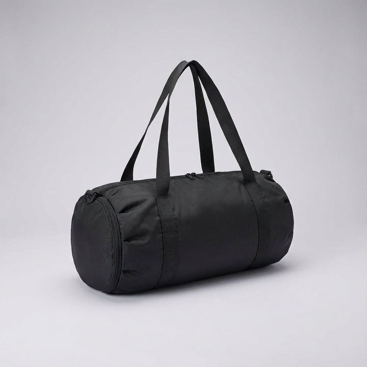 Compact foldable travel and gym duffel bag, unisex design, featuring a convenient wet dry storage pocket.