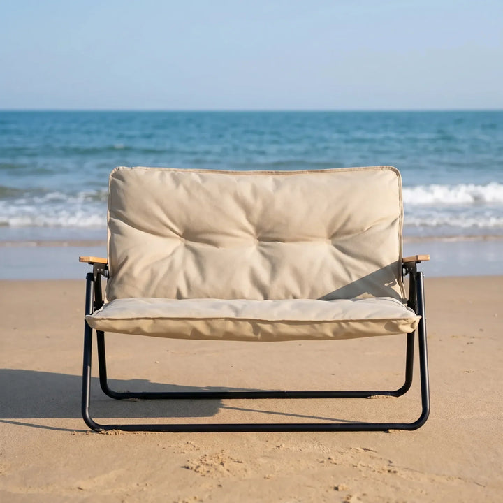 Unisex folding camping sofa for two. Portable outdoor seating, easy setup & transport. Compact folding bench.