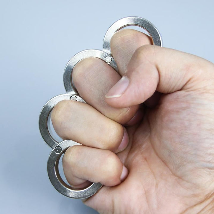 Unisex folding four-finger fidget trigger ring for anxiety relief & focus. Tactile stress reducer.