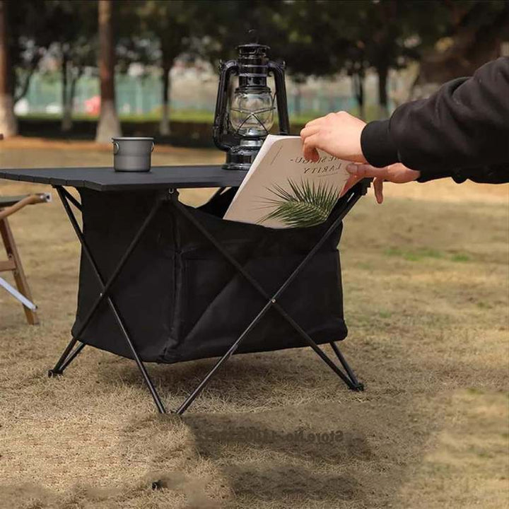 Foldable aluminum picnic table with storage, designed for easy transport and outdoor use