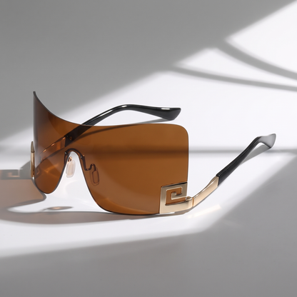 Sleek, frameless futuristic sunglasses for men & women. UV400 polycarbonate lenses provide essential eye protection.