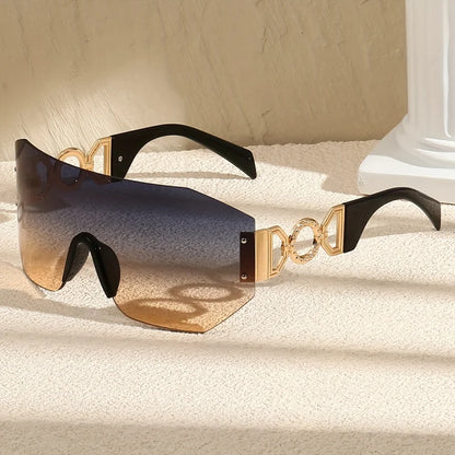 Unisex futuristic frameless sunglasses with UV400 protection and elegant gold temples for bold style.