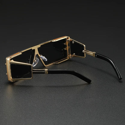 Chic unisex geometric luxury sunglasses with gold details, perfect for a fashionable statement & UV400 eye protection.