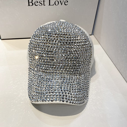Silver glitter hat with intense sparkle, a trendy unisex fashion headwear statement.