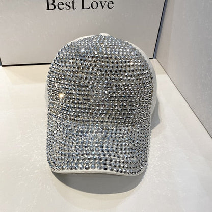 Silver glitter hat with intense sparkle, a trendy unisex fashion headwear statement.
