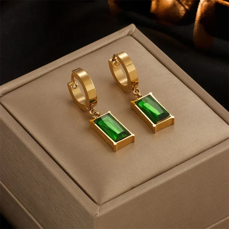 Fashionable unisex statement jewelry set, combining green stone elegance with gold stainless steel design.