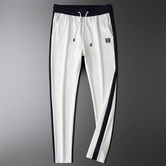 Unisex Hali Comfort Pants in black, featuring an adjustable drawstring for versatile casual, lounge, or athletic wear.