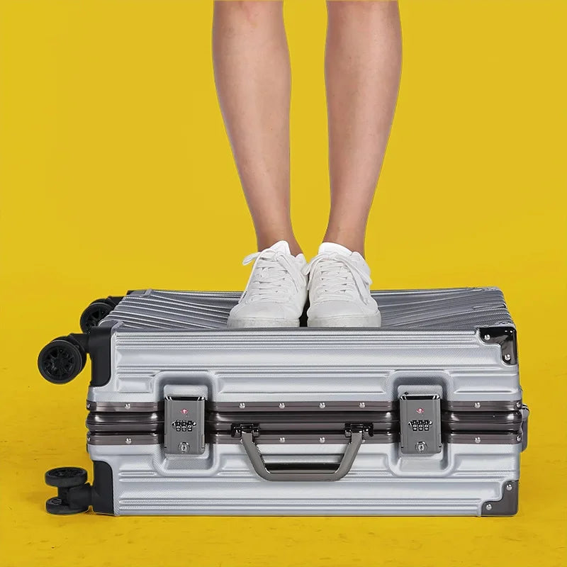 Unisex hard shell suitcase with durable aluminum frame & secure lock. Perfect travel luggage.