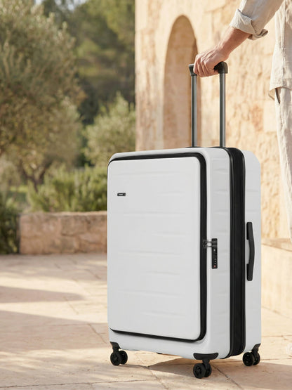 Expandable hardshell carry-on suitcase with front pocket & TSA lock for secure travel.