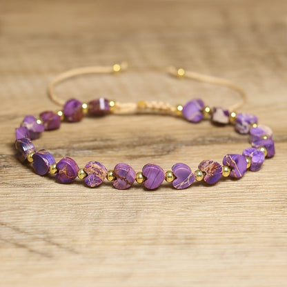 Vibrant gemstone beaded bracelet with a prominent heart charm, natural stone, stackable, handmade.