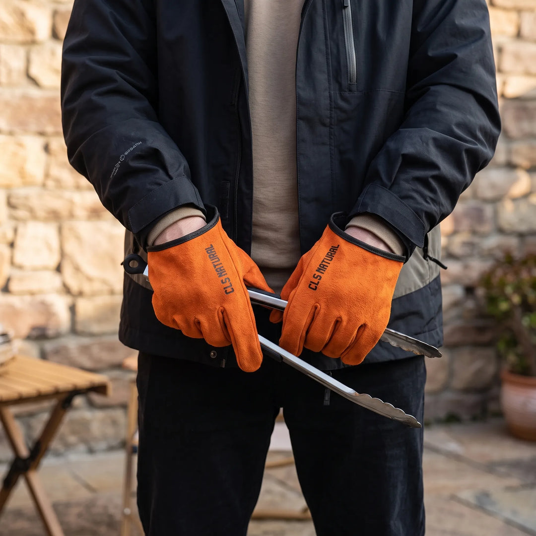 Unisex heavy-duty heat-resistant outdoor gloves for ultimate protection during grilling, camping, and fire pit use.