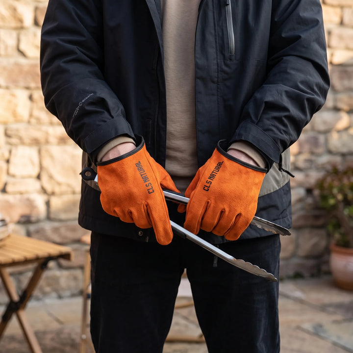 Unisex heavy-duty heat-resistant outdoor gloves for ultimate protection during grilling, camping, and fire pit use.