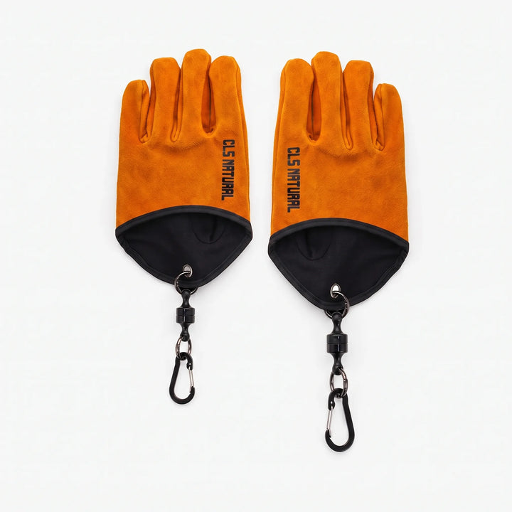 Close-up of durable heat-resistant outdoor gloves, perfect for BBQ, grilling, and campfire protection.