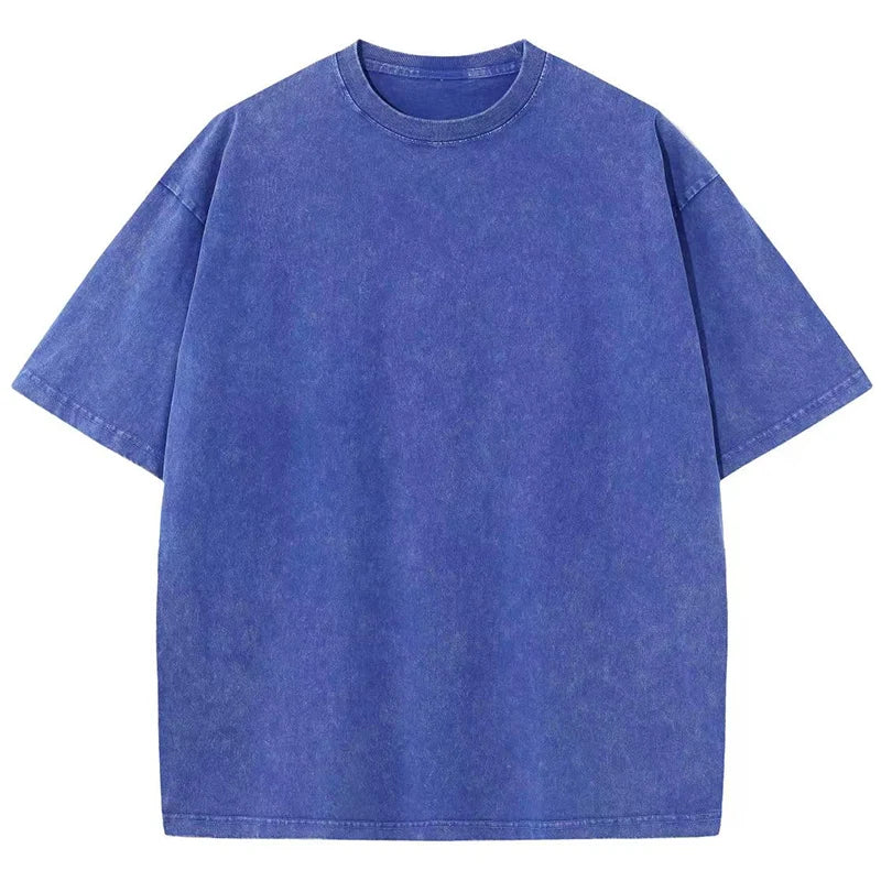 Close-up of the heavyweight fabric & garment-dyed texture on a retro unisex t-shirt with a relaxed fit.