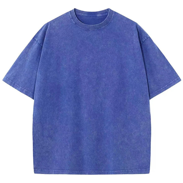 Close-up of the heavyweight fabric & garment-dyed texture on a retro unisex t-shirt with a relaxed fit.