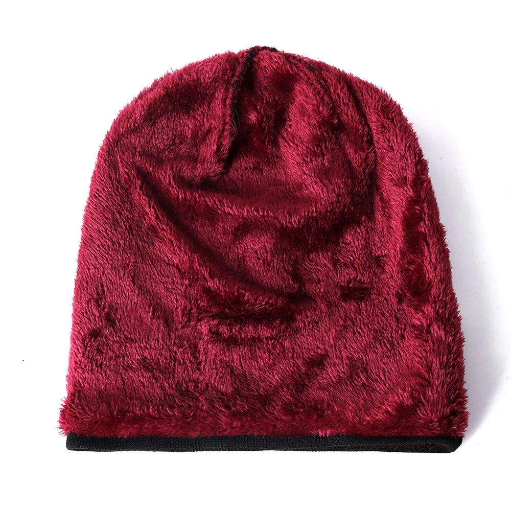 Close-up of classic herringbone knit pattern on a cozy unisex winter beanie hat, soft texture.