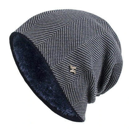 Comfortable unisex herringbone knit beanie hat for cold weather. Features a classic, warm knit design.