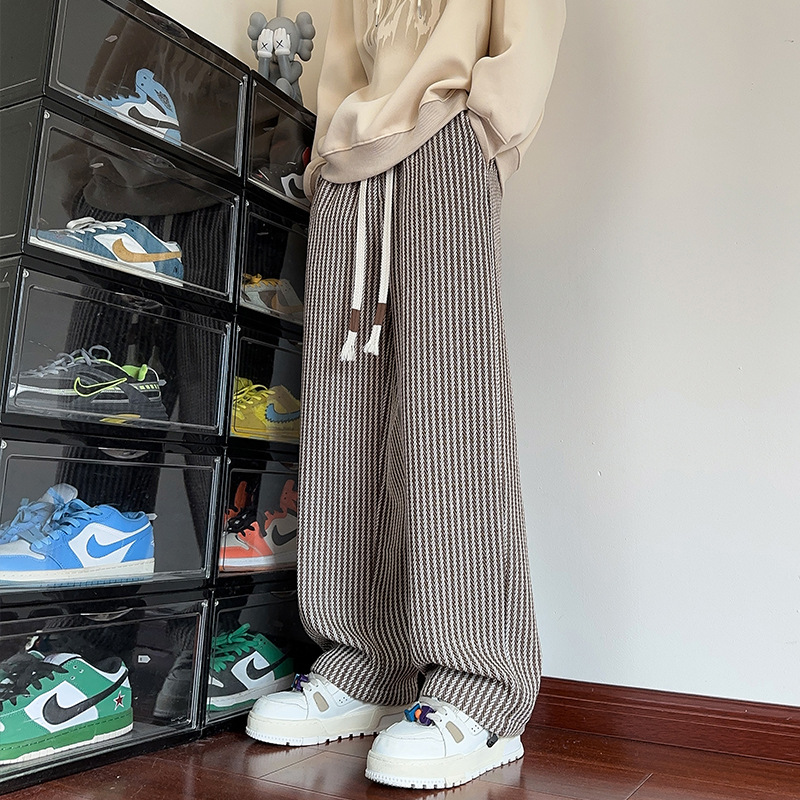 Brown unisex herringbone wide leg sweatpants, featuring a comfortable relaxed fit & drawstring.