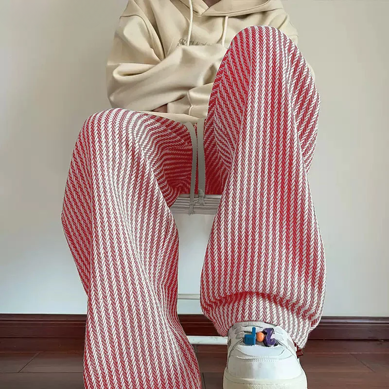Black herringbone relaxed fit sweatpants for unisex, wide leg & adjustable drawstring waist.