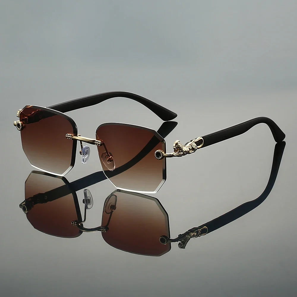 Modern unisex frameless sunglasses with a unique hexagonal lens shape.