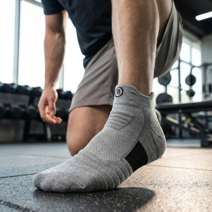 Unisex high elastic compression sports socks for athletic performance, featuring breathability & cushioning.