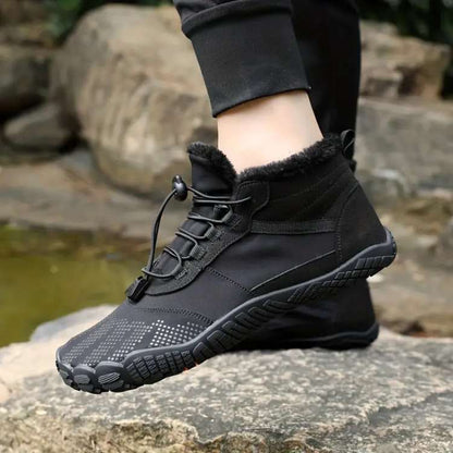 Side view of black unisex high-top minimalist barefoot shoes, emphasizing flexible sole and simple design