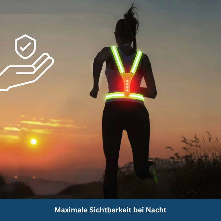 Close-up of a neon yellow high visibility safety vest featuring flashing LED lights for enhanced outdoor safety