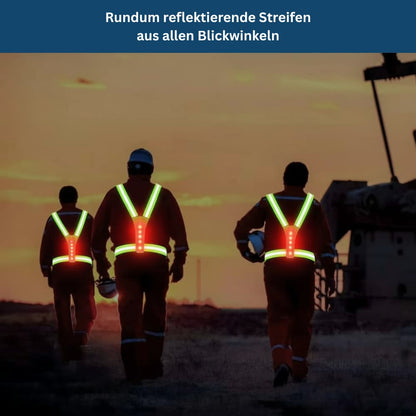 Person wearing a unisex high visibility LED safety vest while jogging, showcasing the reflective material and LED illumination
