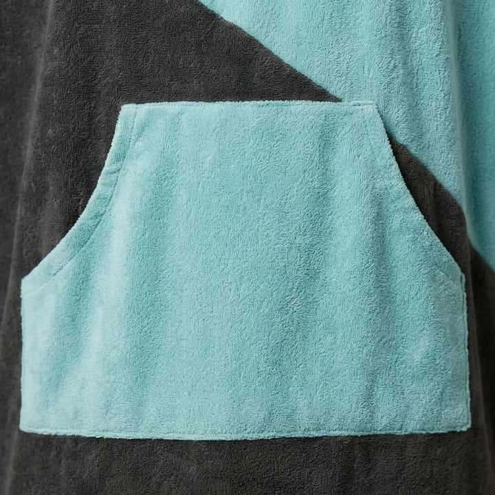 Durable surf poncho with hood, ideal for outdoor changing & quick drying after ocean swims or water sports.