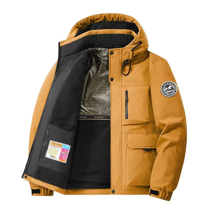 Detail of the robust zipper and weatherproof material on a unisex hooded jacket. Practical and modern design.