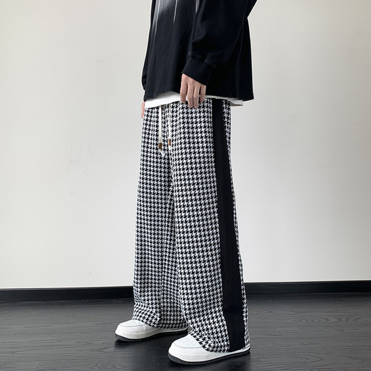 Unisex houndstooth grid print wide-leg sweatpants in black/brown for ultimate comfort & casual style.