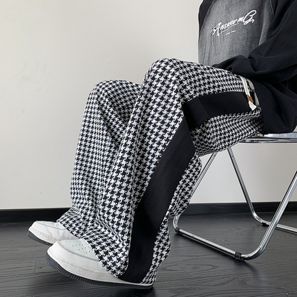 Comfortable unisex wide-leg sweatpants featuring black/brown grid houndstooth print & adjustable waist.