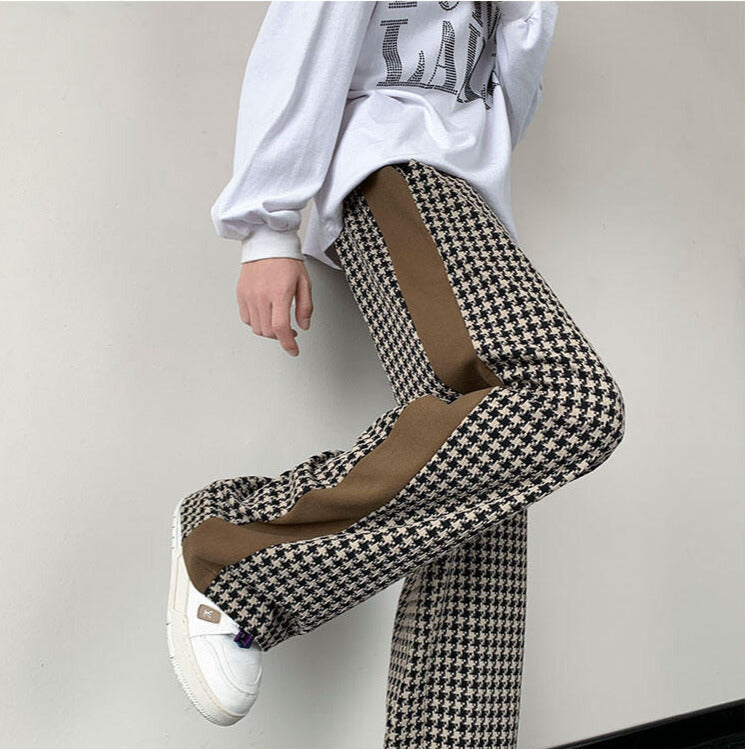 Relaxed fit black & brown grid houndstooth sweatpants, unisex wide-leg design for comfort wear.