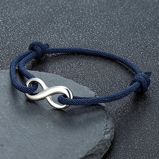Unisex infinity cord bracelet with adjustable braided strap & durable stainless steel charm.