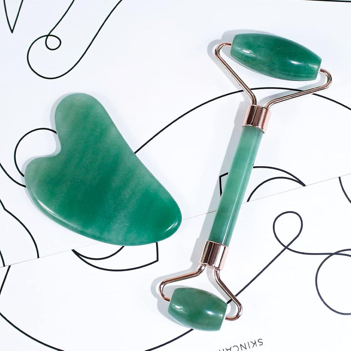 Visually appealing Instant Glow Gua Sha & Jade Roller set, ready for your skincare regimen.
