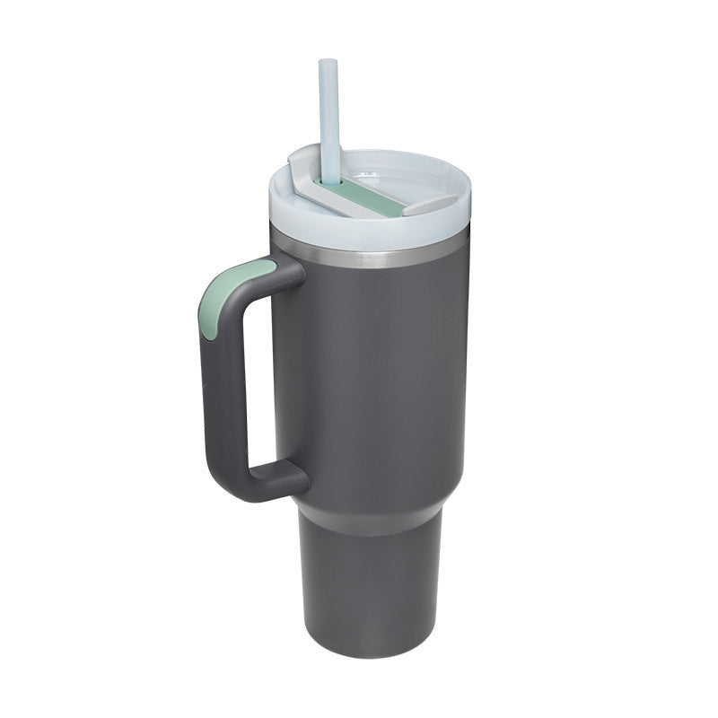 Unisex insulated tumbler, excellent for hot or cold drinks. Handle & straw included for portability.