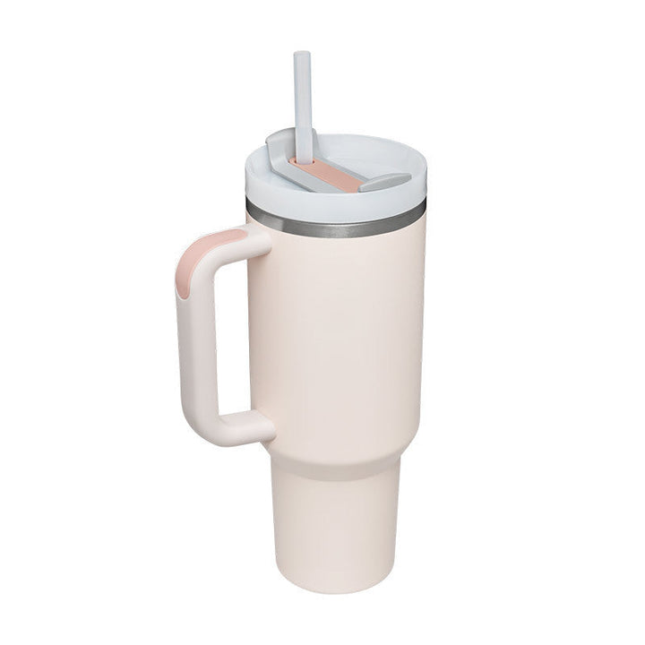 Reusable insulated mug with handle & straw, excellent for daily hydration & travel.