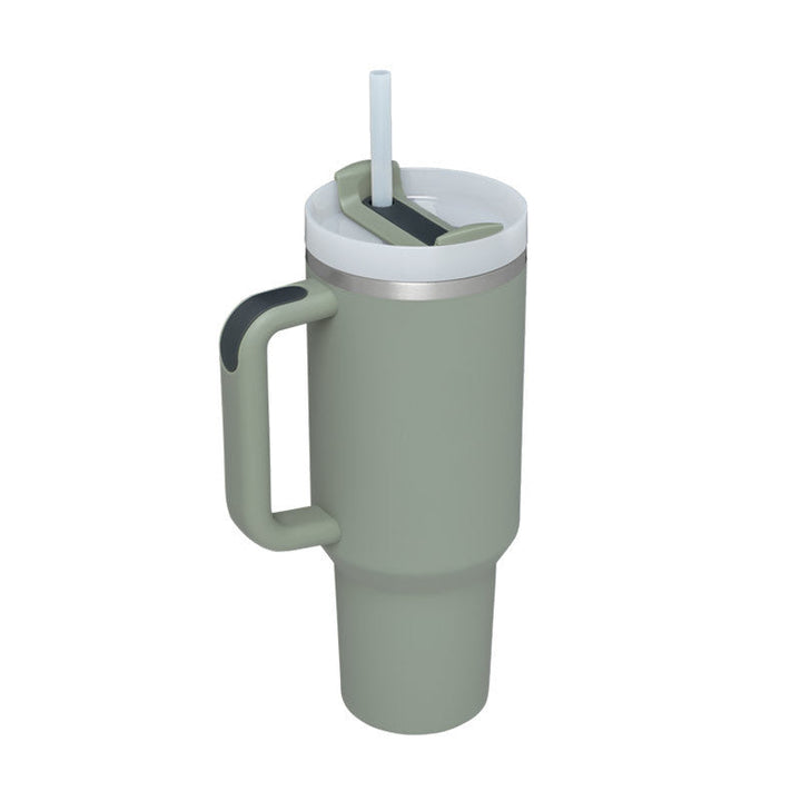 Portable insulated mug, perfect for hydration. Includes a handle & straw for easy sipping on the go.