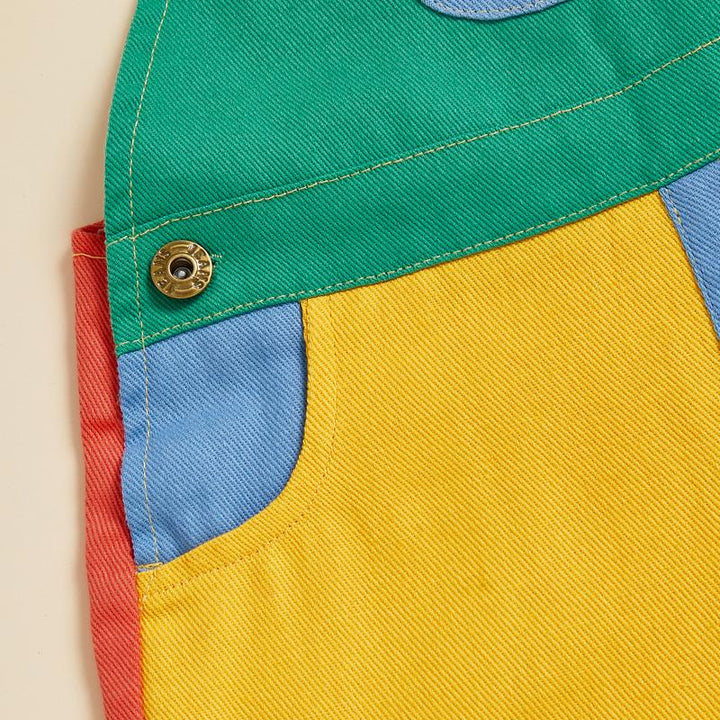 Stylish colorblock cotton twill overalls for toddlers, offering comfort & freedom for energetic play.