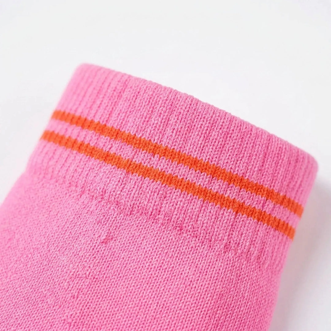 Unisex knee-high compression recovery socks for improved circulation after workouts.