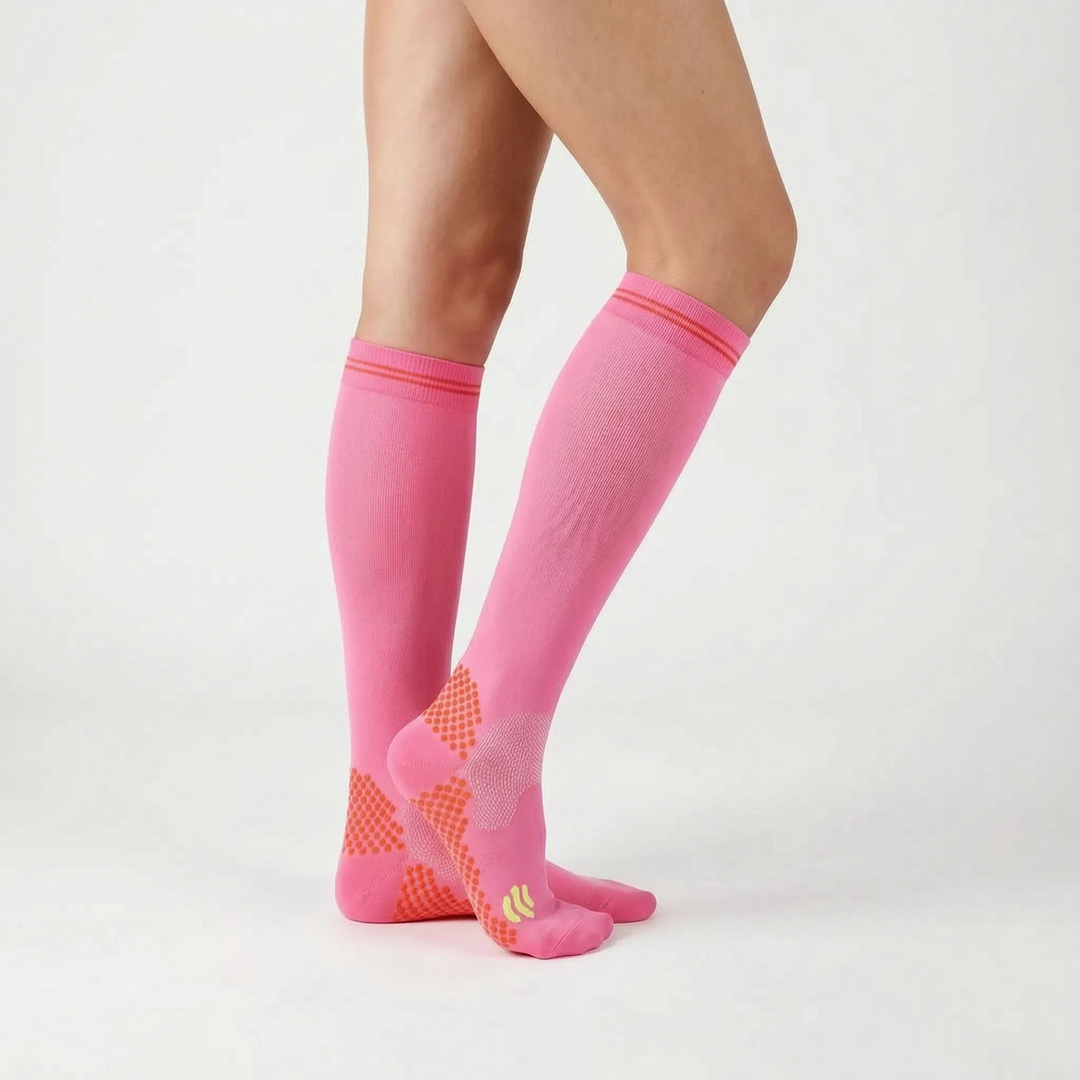 Boost circulation & reduce fatigue with unisex knee-high compression socks for sports.