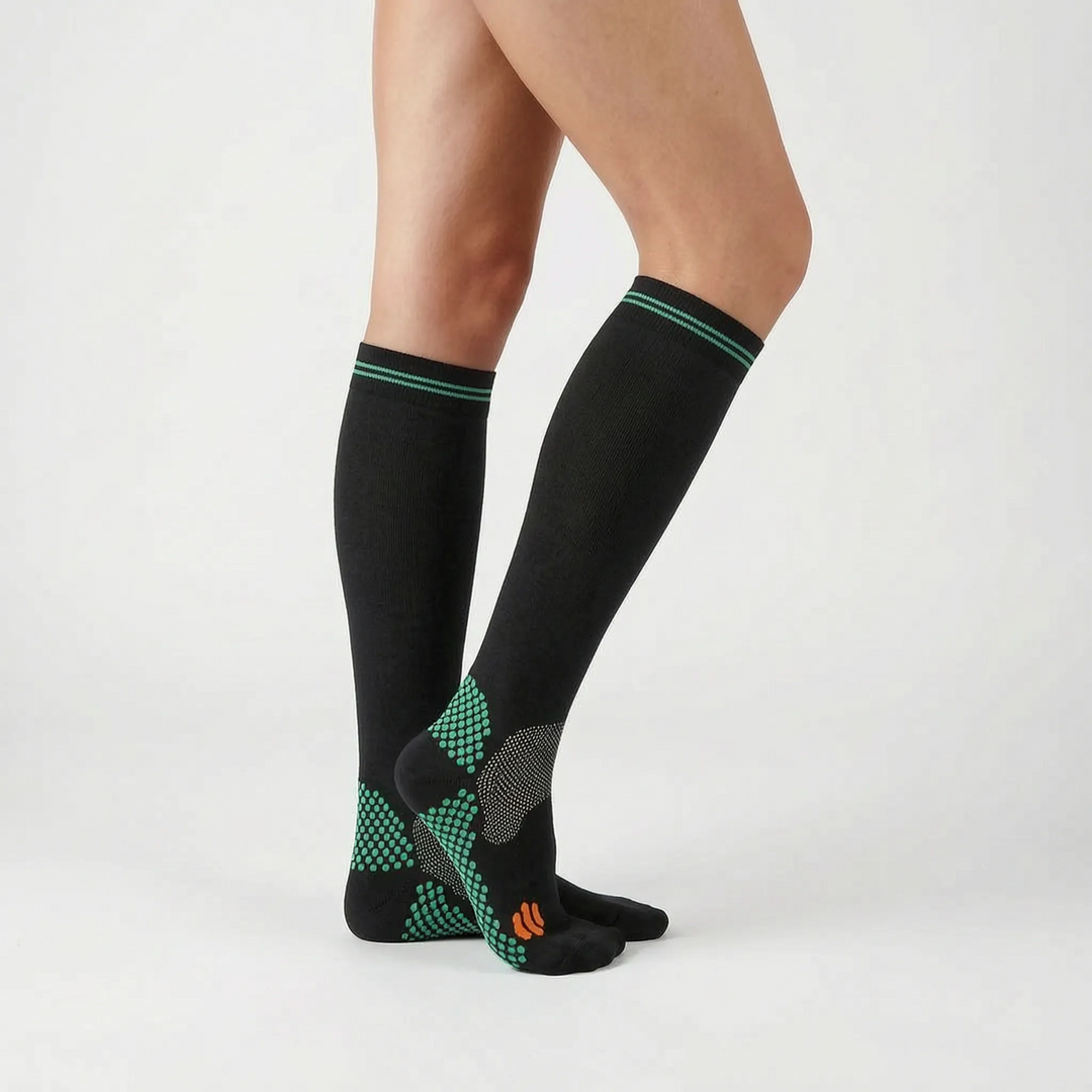 Supportive unisex knee-high compression socks for improved performance & faster recovery in sports.