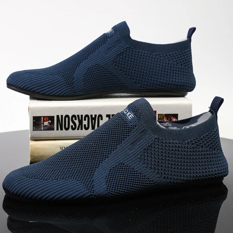 Unisex knit slip-on shoes on a foot, showcasing the barefoot style, lightweight feel, and breathable comfort.