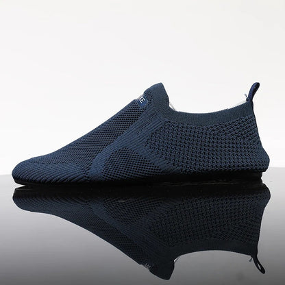 3/4 view of casual unisex knit slip-on shoes, emphasizing their lightweight construction and breathable barefoot comfort.