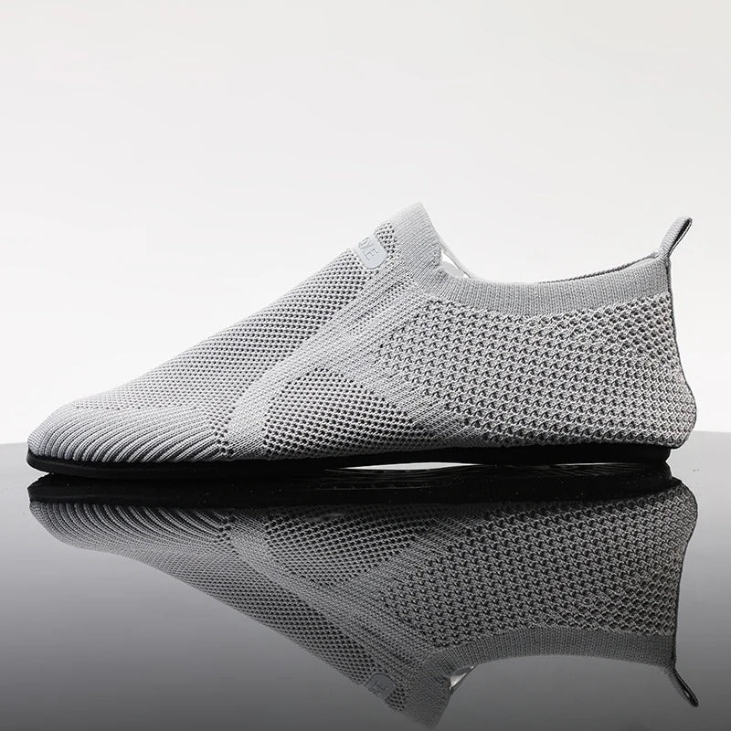 Unisex breathable knit slip-on shoes. Lightweight barefoot style for comfortable walking.
