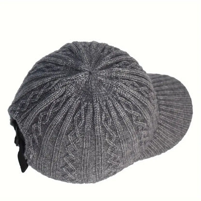 Warm knitted cap, a practical unisex accessory for autumn and winter season wear.