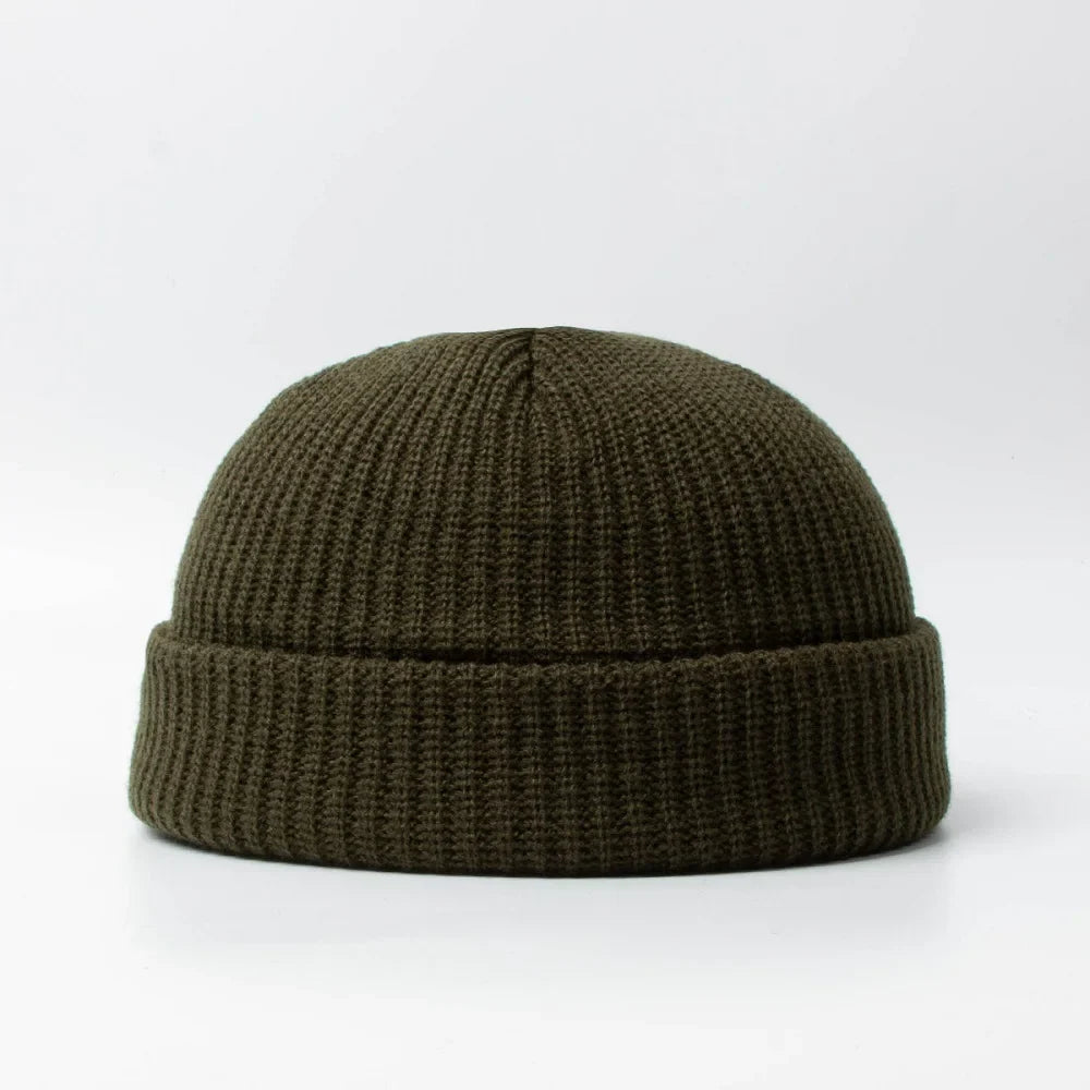 Unisex knitted beanie, a cozy skull cap for warmth. Soft cotton blend winter hat, essential headwear.